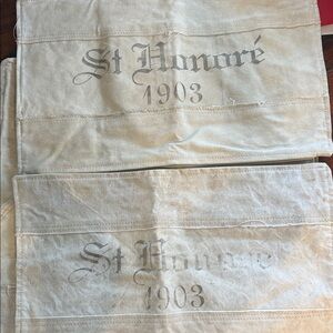 2 Restoration Hardware Cream St Honoré Pillows grain sack. Very thick canvas.